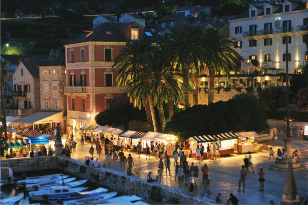 View of the port of Hvar, lit up at night