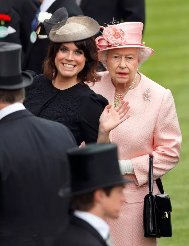 Princess Eugenie of York and Queen Elizabeth II attend Day 1 of Royal Ascot at Ascot Racecourse on June 18, 2013 in Ascot, England. 