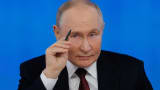 Russian President Vladimir Putin winks during his annual televised year-end press conference and phone-in held in Moscow, Russia December 19, 2024. 