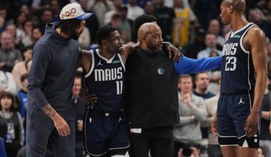 Mavericks star Kyrie Irving helped off the floor after awkward knee injury early in matchup with Kings