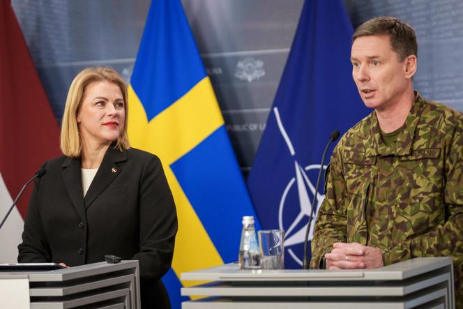 Latvian Prime Minister Evika Silina and Kaspars Pudans, commander of the Latvian National Armed Forces, at a press conference in Riga, Latvia, February 7, 2025.
