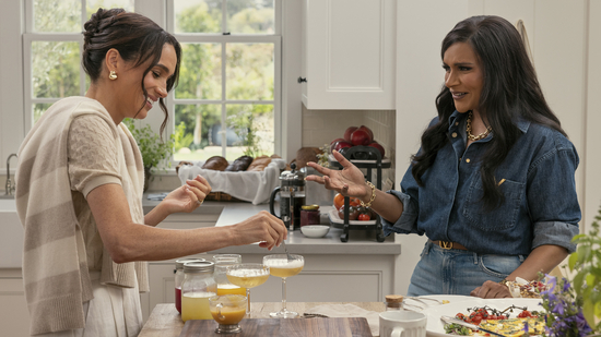 This image released by Netflix shows Meghan, Duchess of Sussex, left, and Mindy Kaling in a scene from "With Love, Meghan." (Netflix via AP)(AP)