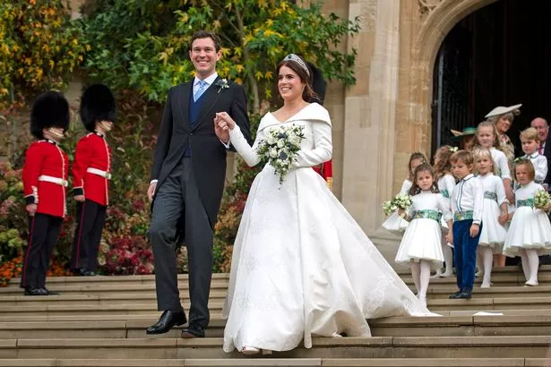 Princess Eugenie of York and Jack Brooksbank leave St George's Chapel in Windsor Castle following their wedding