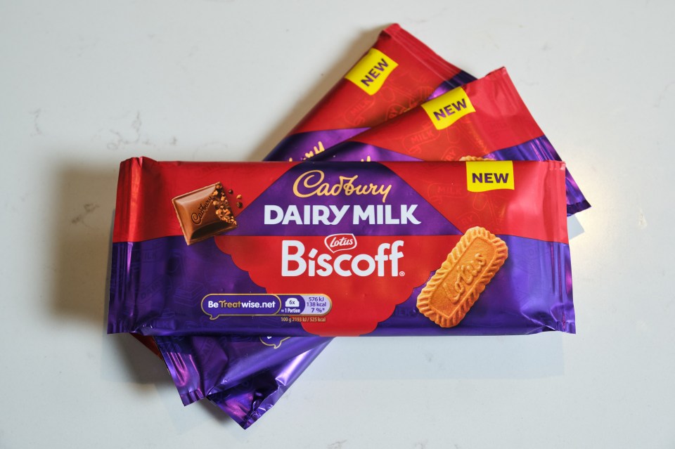 Three Cadbury Dairy Milk Biscoff chocolate bars.