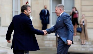 French President Emmanuel Macron, left, welcomes Slovak Prime Minister Robert Fico at the Elysee Palace in Paris, Monday, February 26, 2024.