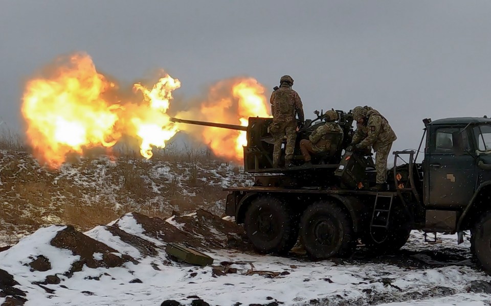 Ukrainian soldiers firing an anti-aircraft gun near Bakhmut.