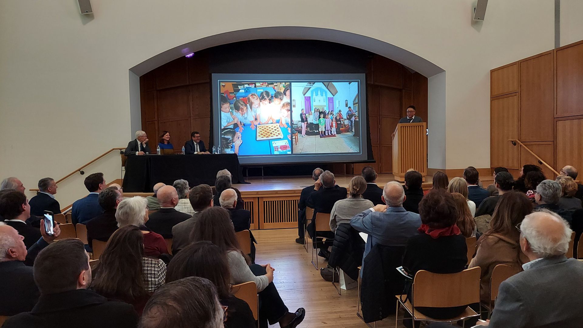 Prof. Young Richard Kim tells of his family’s experience on Cyprus. Mr. Keith Peterson, panel moderator, sits at the far left, with Dr. Crewe and Ambassador Savva