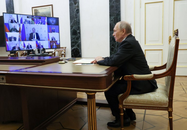 Russian President Vladimir Putin chairs a meeting with members of the Security Council via a video link in Moscow, Russia, March 28, 2025. Sputnik/Vyacheslav Prokofyev/Pool via REUTERS ATTENTION EDITORS - THIS IMAGE WAS PROVIDED BY A THIRD PARTY.