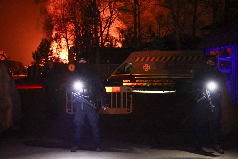 Ukrainian police cordon off access to the site of a fire in a restaurant caused by a Russian drone strike, amid Russia's attack on Ukraine, in Dnipro, Ukraine March 28, 2025. REUTERS/Violeta Santos Moura