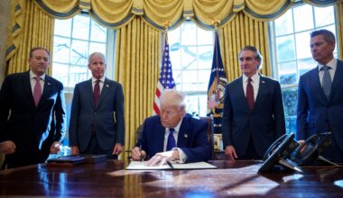 President Trump signs an executive order at the White House.