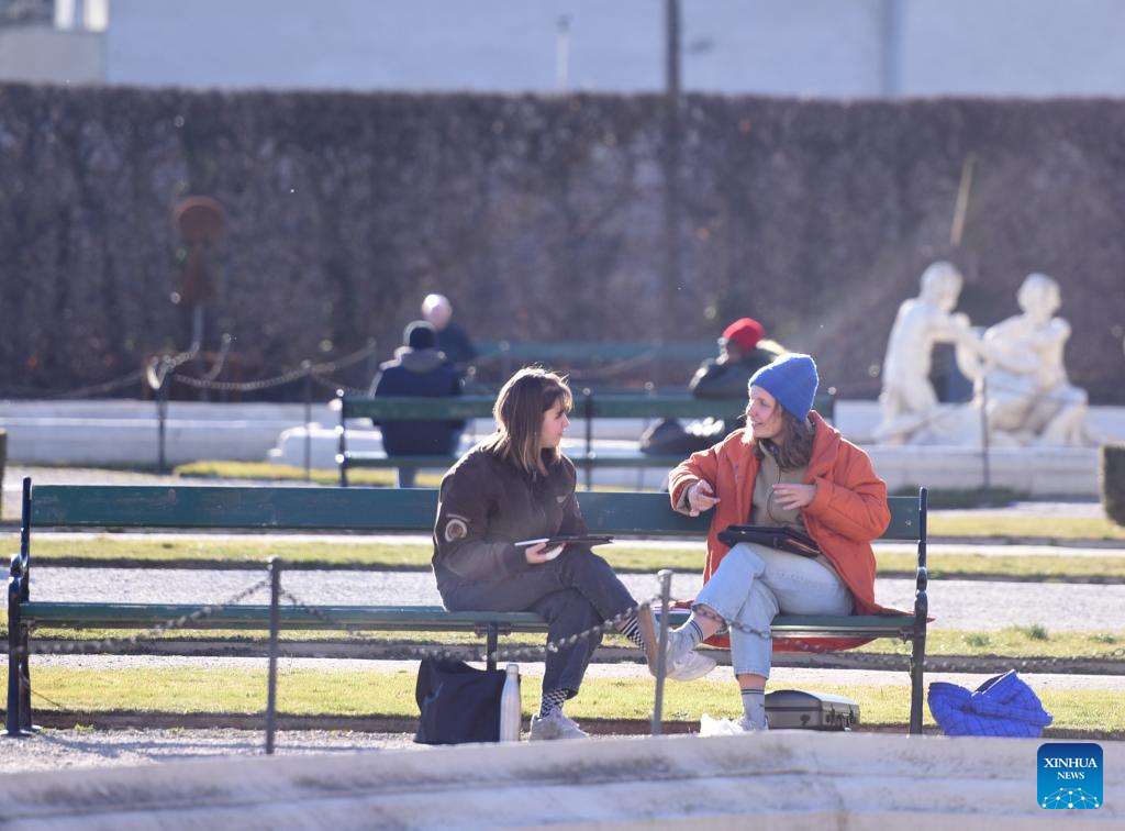 People enjoy leisure time at Belvedere Garden in Vienna, Austria-Xinhua