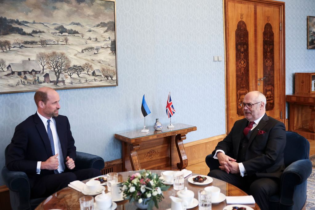 The Prince of Wales speaking with President Alan Karis