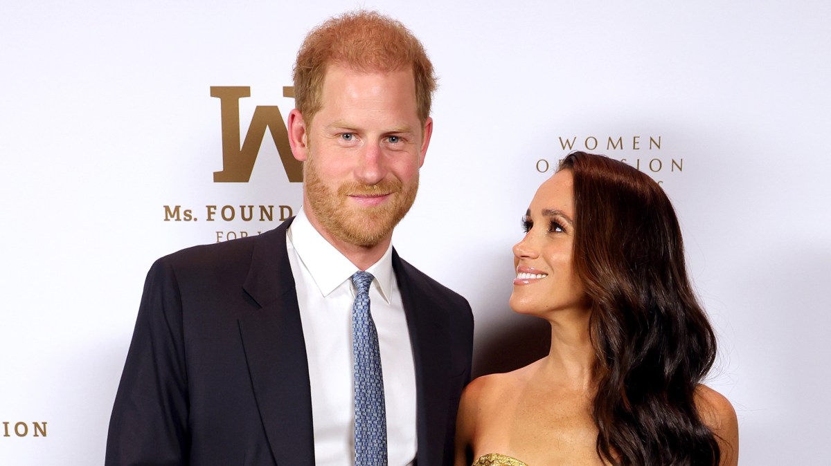 Poor, delusional Prince Harry is now the handbag carrier