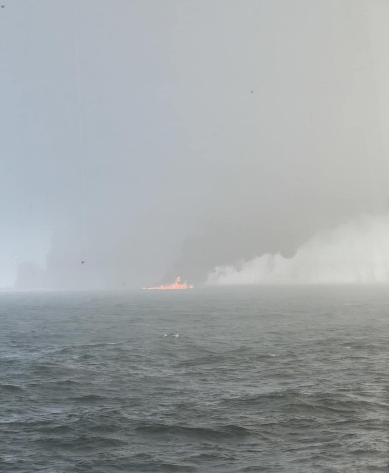 Handout photo of black smoke billowing into the air after a crash between an oil tanker and a cargo ship off the coast of East Yorkshire. Lifeboats and a coastguard helicopter were called to the collision in the Humber Estuary just before 10am, believed to involve a US-flagged tanker called the MV Stena Immaculate. The American tanker was at anchor, according to ship tracking tool Vesselfinder. So far 32 casualties have been brought ashore - but some crew members are yet to be accounted for, a port boss has said.  Issue date: Monday March 10, 2025. PA Photo. See PA story SEA Collision. Photo credit should read: Bartek Smialek/PA Wire 

NOTE TO EDITORS: This handout photo may only be used in for editorial reporting purposes for the contemporaneous illustration of events, things or the people in the image or facts mentioned in the caption. Reuse of the picture may require further permission from the copyright holder. 
