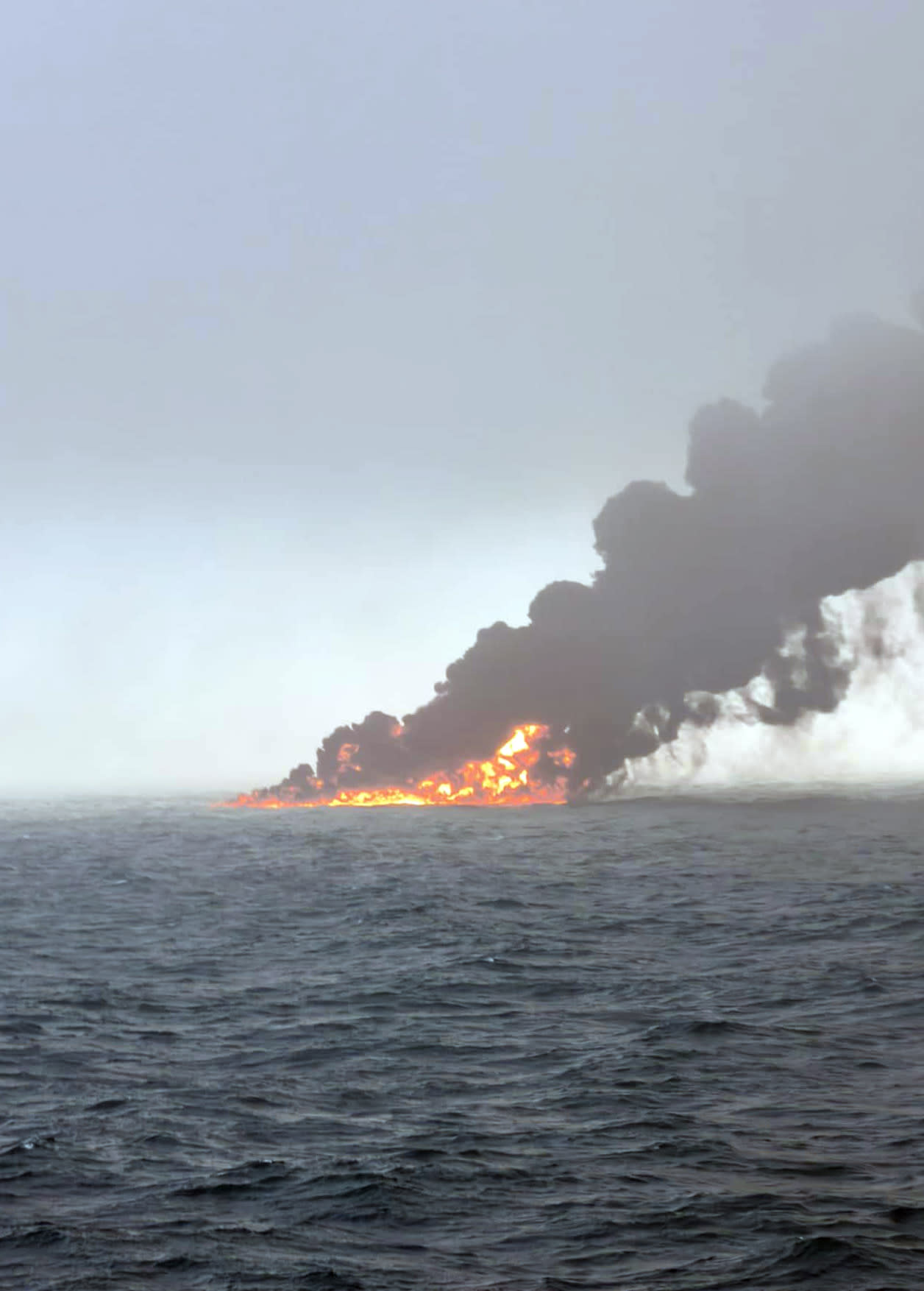 Handout photo of black smoke billowing into the air after a crash between an oil tanker and a cargo ship off the coast of East Yorkshire. Lifeboats and a coastguard helicopter were called to the collision in the Humber Estuary just before 10am, believed to involve a US-flagged tanker called the MV Stena Immaculate. The American tanker was at anchor, according to ship tracking tool Vesselfinder. So far 32 casualties have been brought ashore - but some crew members are yet to be accounted for, a port boss has said.  Issue date: Monday March 10, 2025. PA Photo. See PA story SEA Collision. Photo credit should read: Bartek Smialek/PA Wire 

NOTE TO EDITORS: This handout photo may only be used in for editorial reporting purposes for the contemporaneous illustration of events, things or the people in the image or facts mentioned in the caption. Reuse of the picture may require further permission from the copyright holder. 
