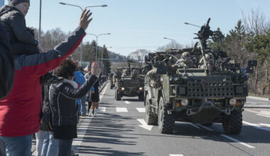 Polish citizens greet the Soldiers of Battle Group Poland as the convoy of tactical vehicles crosses the border from the Czech Republic into Poland March 26, 2017.