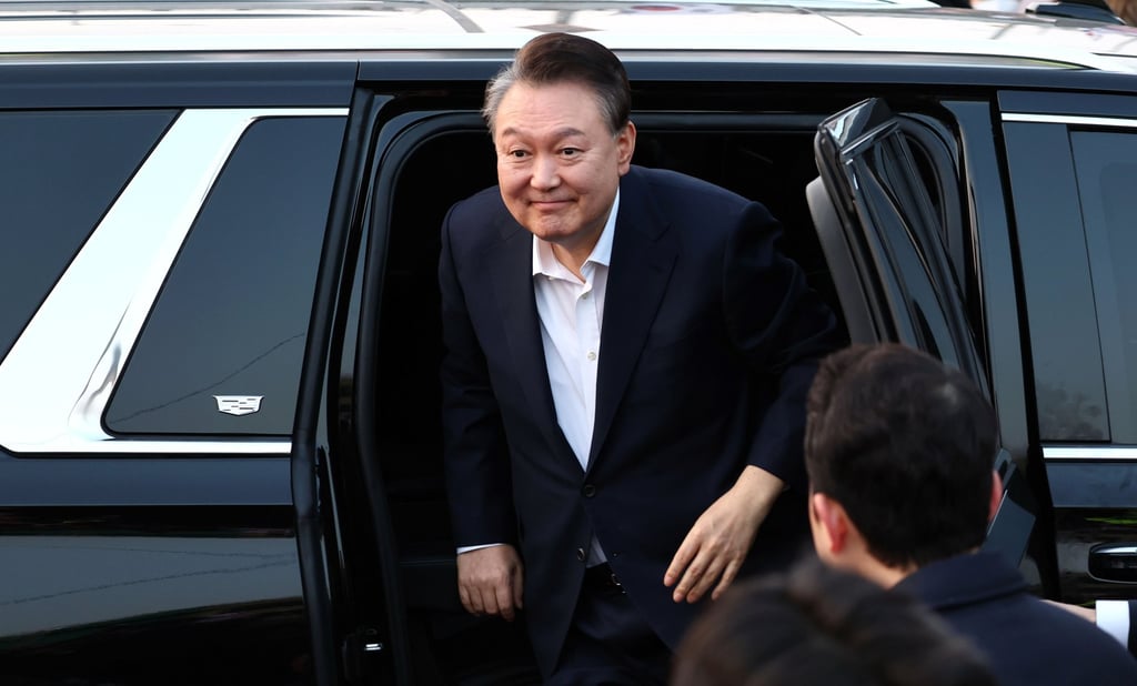 South Korea’s impeached president Yoon Suk-yeol arrives at his official residence after being released from detention on March 8. Photo: EPA-EFE South Korea’s impeached president Yoon Suk-yeol arrives at his official residence after being released from detention on March 8. Photo: EPA-EFE