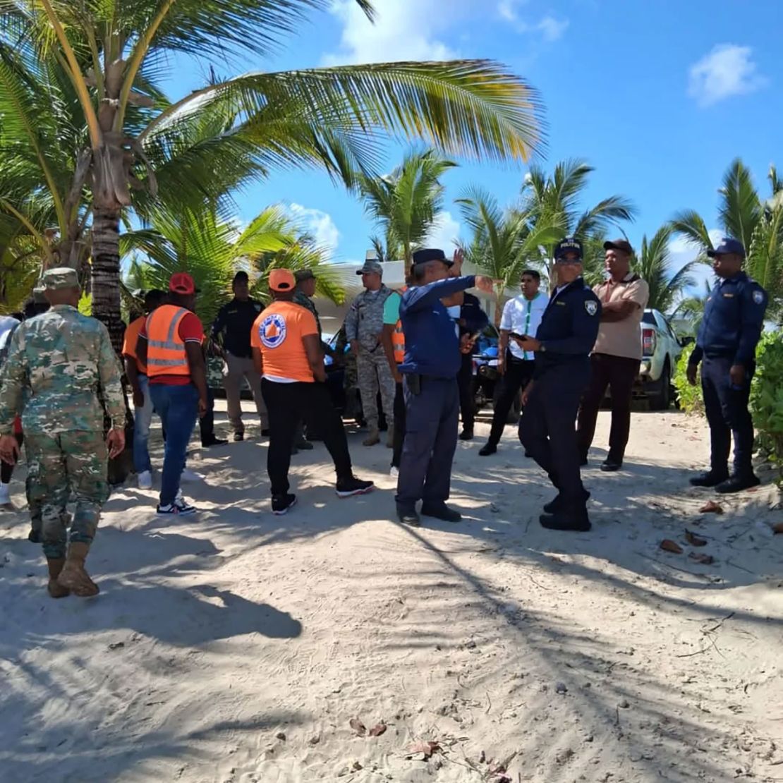 In this photo shared by Defensa Civil La Altagracia on Saturday, March 8, people from various institutions search the coastal area of Bávaro, Dominican Republic, for Sudiksha Konanki.