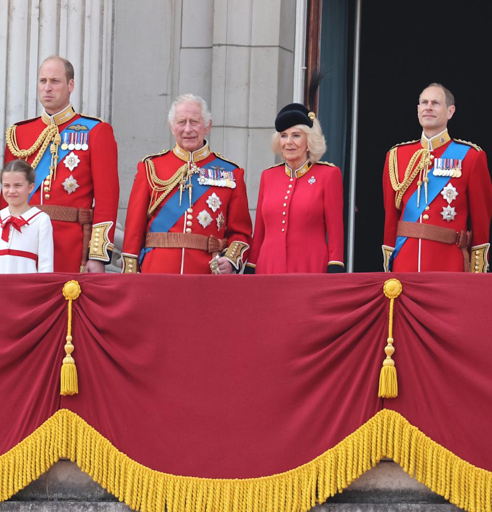 Royals including The King and Queen standing on the balcony in uniforms during Trooping the Colour 2023.