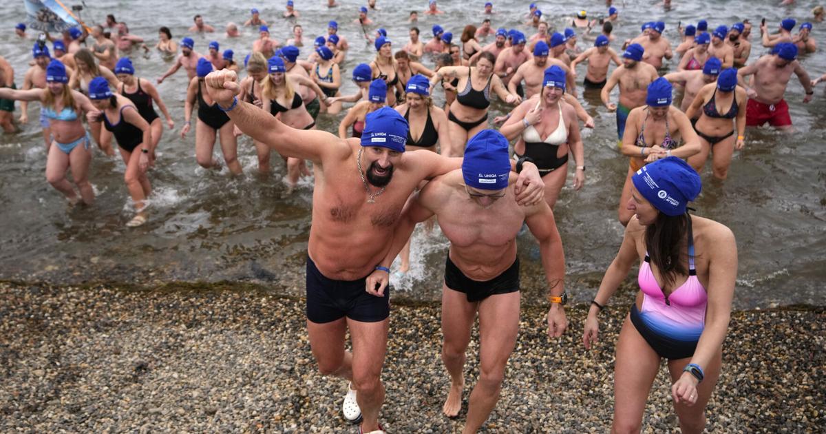 Cold-water swimmers in the Czech Republic set a new world record for the largest polar bear dip | World