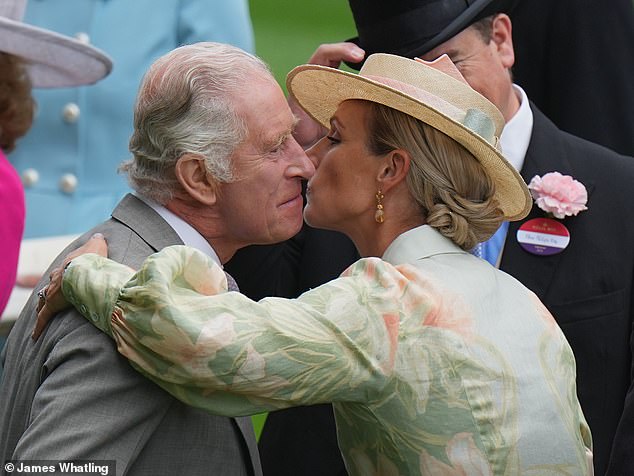 Pictured: Zara Tindall kissing King Charles on the cheek at Royal Ascot in June 2023. The King's nieces stepped up last week to help host a garden party at Buckingham Palace with the Prince of Wales - amid the monarch and Princess of Wales ' cancer treatments