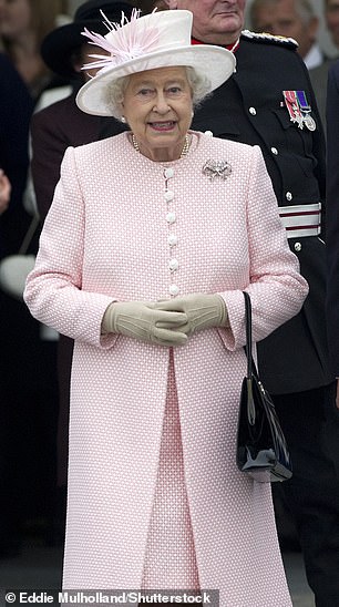 Queen Elizabeth donned a soft pink ensemble while visiting Margate in November 2011