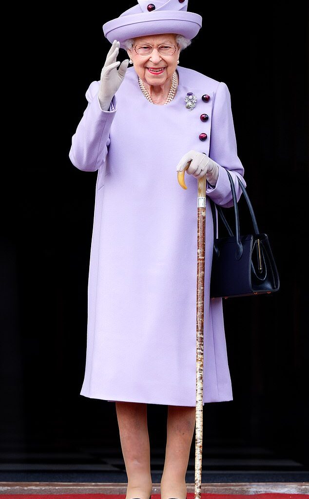 Queen Elizabeth's outfits were carefully considered to ensure she stood out in a crowd of well-wishers - despite her modest height of 5ft 3in. Above: The Queen attends a parade in the gardens of the Palace of Holyroodhouse on June 28, 2022