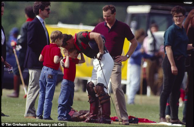 Prince Charles with Prince William and Prince Harry at a polo match