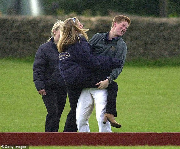 Prince Harry spends time with two female friends June 9, 2001, at the Beaufort Polo Club near Tetbury in Gloucestershire