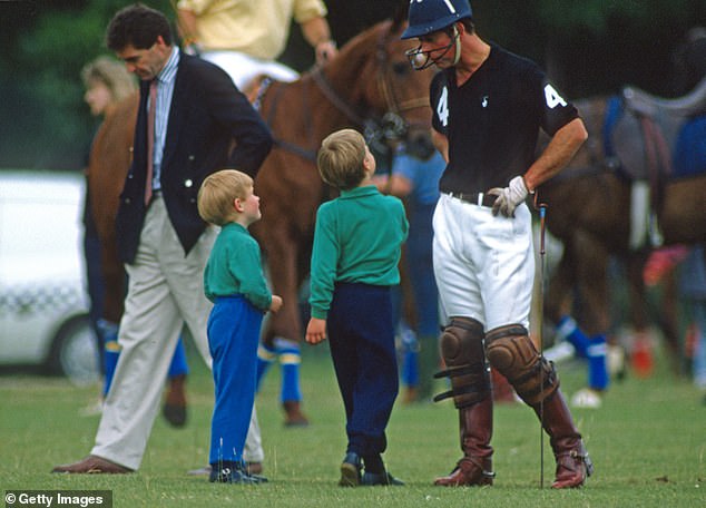 Prince William and Prince Harry speak to their father Prince Charles as they attend a polo match at Cirencester Park on June 15, 1989