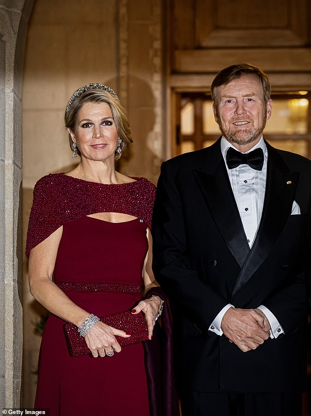Máxima's full-length gown featured a beaded cape and matching waist belt