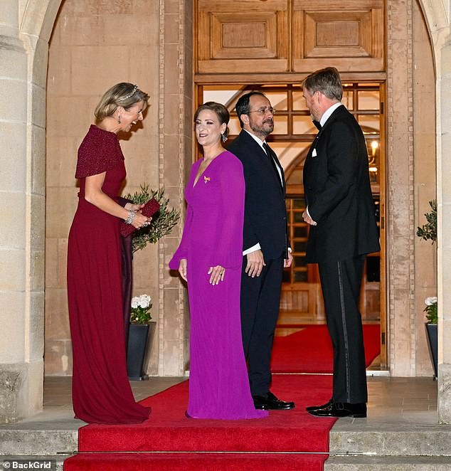 Máxima and Philippa appeared to share a joke while their husbands appeared happy to see one another