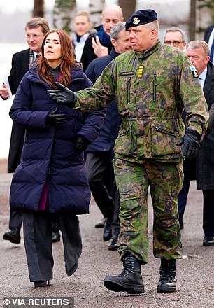 The couple had wrapped up warm for the visit