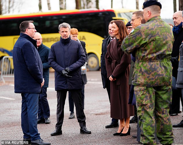 Denmark's King Frederik and Queen Mary (not seen) along with the Finnish presidential couple, Alexander Stubb and his spouse Suzanne Innes-Stubb