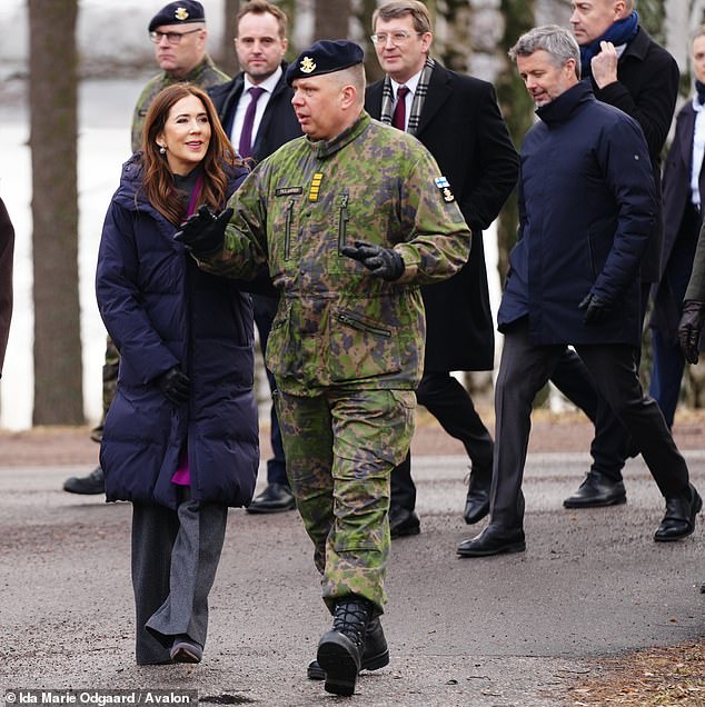 Queen Mary and King Frederik of Denmark showed their serious side as they visited a garrison on the second day of their state visit to Finland