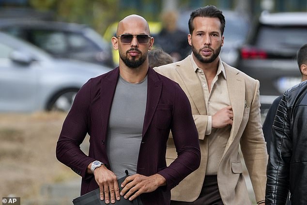 Andrew Tate, left, and his brother Tristan, arrive at the Bucharest Tribunal in Bucharest, Romania in November 2023