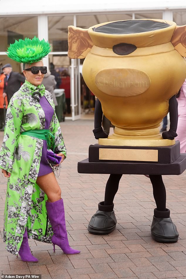 Racegoer Lisa Luse was striking in her neon green ensemble, comprising an open coat, a purple dress, matching heeled boots, and a darker green belt to cinch her waist
