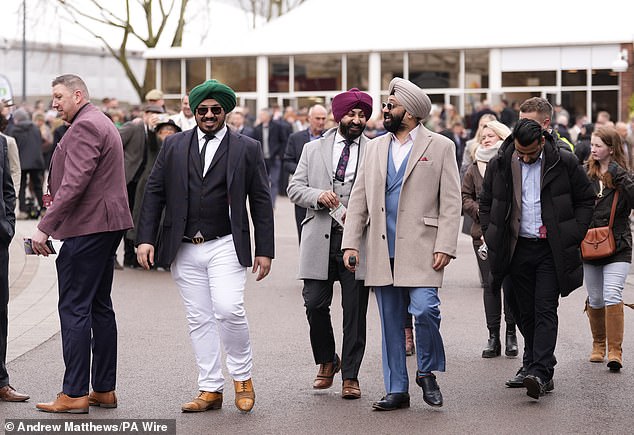 Racegoers arriving for day two of the 2025 Cheltenham Festival at Cheltenham Racecourse