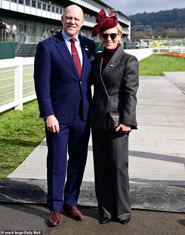 The royal equestrian, 42, once again picked a neutral pantsuit - this time Zara opted for a grey ensemble - with a pop of colour, as a burgundy turtleneck peeked through her blazer