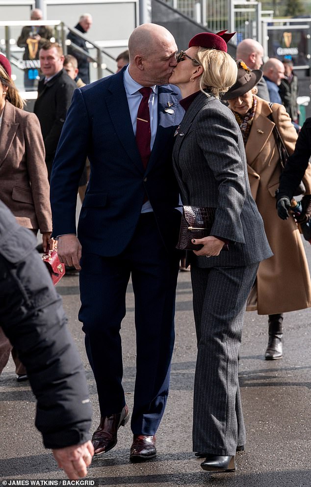 Meanwhile Zara and her rugby-playing husband Mike shared a smooch as they arrived for the day of festivities