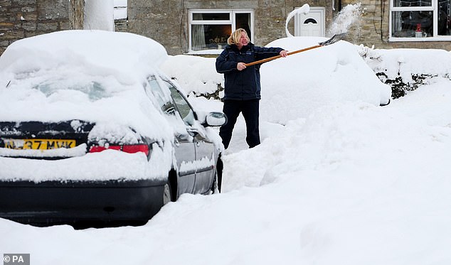 Scientists say a negative North Atlantic oscillation (NAO) caused an unusually cold winter in Europe 15 years ago. Pictured, a driver tries to dig a car out from under the snow in Allendale, Northumberland, January 5, 2010