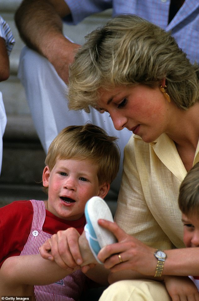 Diana is captured helping Harry put on his shoes on the steps of Marivent Palace on in 1987 in Palma, Majorca