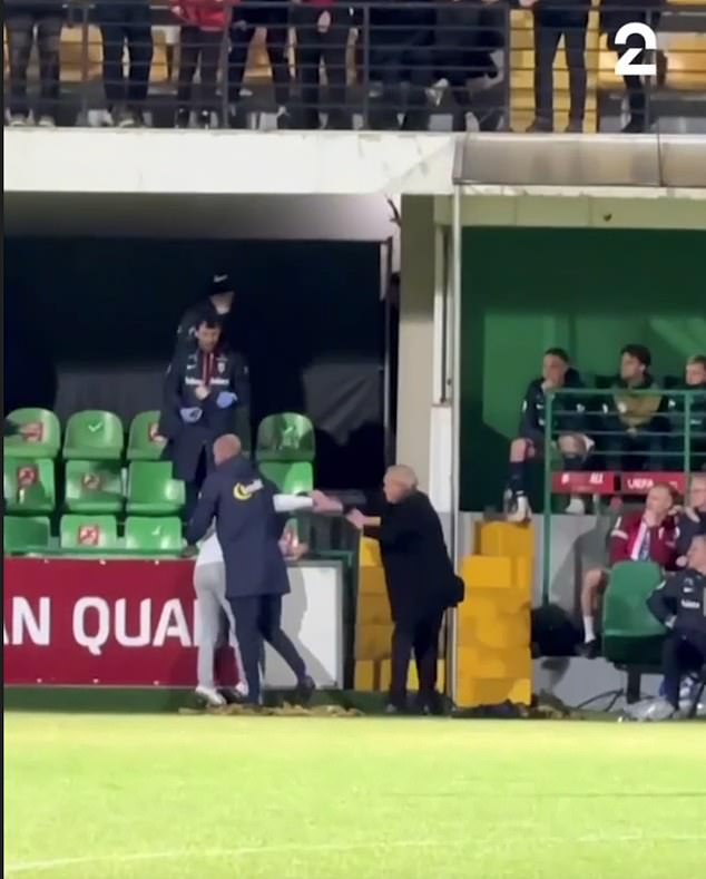 The pitch invader got within touching distance of the striker, who was sat on the bench