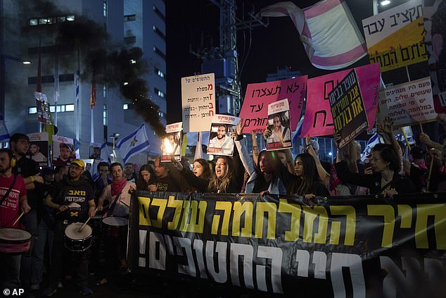People take part in a protest demanding the immediate release of hostages held by Hamas in the Gaza Strip, in Tel Aviv, Israel, on March 29