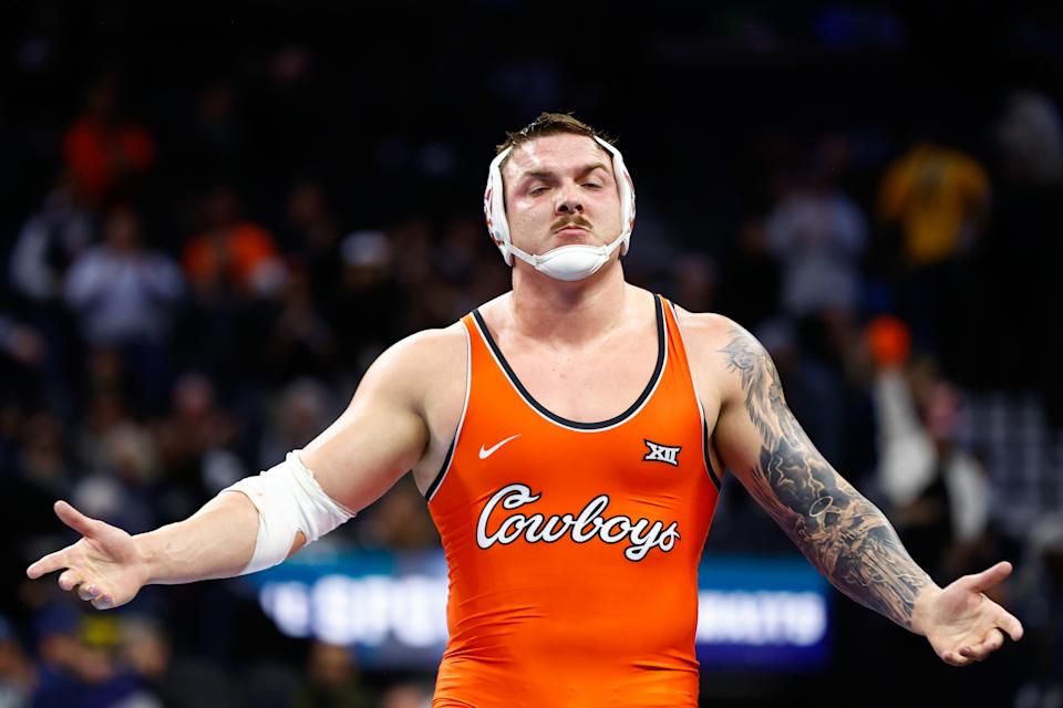 PHILADELPHIA, PENNSYLVANIA - MARCH 21: Wyatt Hendrickson of Oklahoma State University reacts after defeating Greg Kerkvliet of Pennsylvania State University in the 285-pound class during the Division I Men's Wrestling Championship held at the Wells Fargo Center on March 21, 2025 in Philadelphia, Pennsylvania. (Photo by Isaac Wasserman/NCAA Photos via Getty Images)