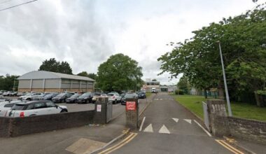 Police called to secondary school as man assaulted and second arrested