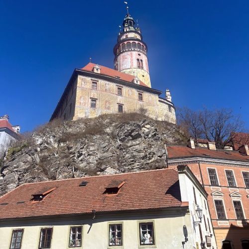 A view of Cesky Krumlov Castle from the old town. A view of Cesky Krumlov Castle from the old town.
