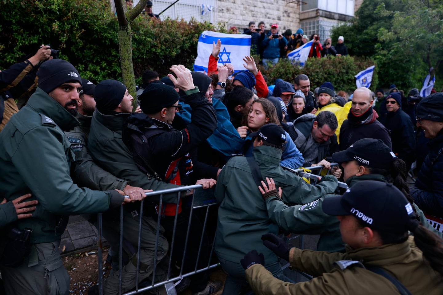 Israeli protesters and police scuffle during a demonstration calling for an end to the war in Gaza and to bring home all the hostages held by Hamas since the October 7, 2023 attacks, in front of the prime minister's residence in Jerusalem on March 20.