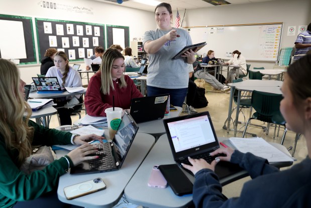 Sarah Murmann teaches confidence intervals in her statistics class at Crystal Lake South High School, March 18, 2025. (Antonio Perez/Chicago Tribune)