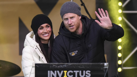 Prince Harry and his wife Meghan, the Duke and Duchess of Sussex, attend a welcome celebration during the 2025 Invictus Games, in Whistler, British Columbia, Monday, Feb. 10, 2025. (Darryl Dyck/The Canadian Press via AP)(AP)